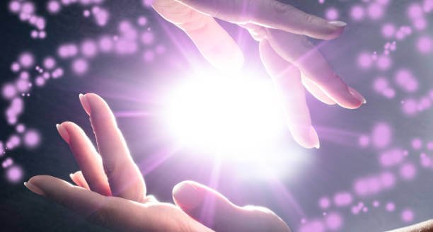 Close-up Of Mysterious Glowing Power In The Hands